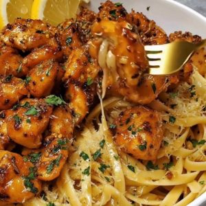Orange Spicy Chicken over Pasta